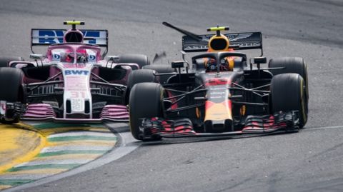 SAO PAULO, BRAZIL - NOVEMBER 11:  Max Verstappen of the Netherlands driving the (33) Aston Martin Red Bull Racing RB14 TAG Heuer is crashed into by Esteban Ocon of France driving the (31) Sahara Force India F1 Team VJM11 Mercedes on track during the Formula One Grand Prix of Brazil at Autodromo Jose Carlos Pace on November 11, 2018 in Sao Paulo, Brazil.  (Photo by Lars Baron/Getty Images) // Getty Images / Red Bull Content Pool  // AP-1XFYY9TWS1W11 // Usage for editorial use only // Please go to www.redbullcontentpool.com for further information. // 