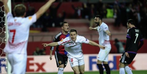 "Sevilla's French forward Kevin Gameiro (C) celebrates after scoring a goal during the UEFA Europa League round of 16 second leg football match between Sevilla FC vs FC Basel 1893 at the Ramon Sanchez Pizjuan stadium in Sevilla on March 17, 2016. / AFP / CRISTINA QUICLER        (Photo credit should read CRISTINA QUICLER/AFP/Getty Images)"