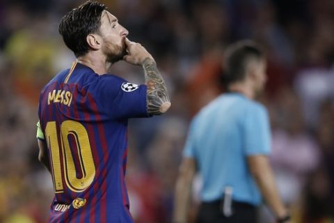 Barcelona forward Lionel Messi celebrates after scoring his side's third goal during the group B Champions League soccer match between FC Barcelona and PSV Eindhoven at the Camp Nou stadium in Barcelona, Spain, Tuesday, Sept. 18, 2018. (AP Photo/Manu Fernandez)