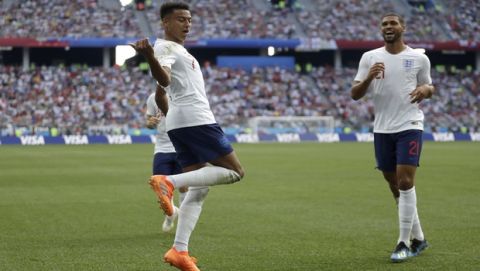 England's Jesse Lingard reacts as he celebrates after scoring his team's third goal during the group G match between England and Panama at the 2018 soccer World Cup at the Nizhny Novgorod Stadium in Nizhny Novgorod , Russia, Sunday, June 24, 2018. (AP Photo/Matthias Schrader)