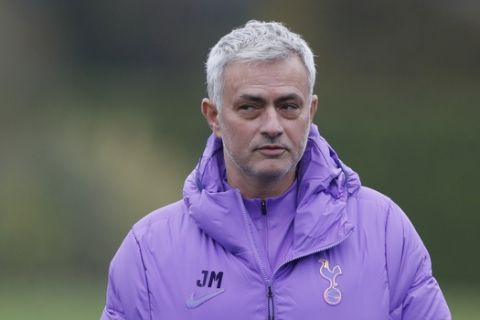Tottenham Hotspur's manager Jose Mourinho watches his players during a training session at their training ground in London, Monday Nov. 25, 2019, ahead of their Champions League Group B soccer match against Olympiakos on Tuesday. (AP Photo/Alastair Grant)