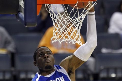 Hampton's Danny Agbelese dunks during practice for an NCAA West regional tournament college basketball game in Charlotte, N.C., Thursday, March 17, 2011. Hampton plays Duke on Friday. (AP Photo/Bob Leverone)