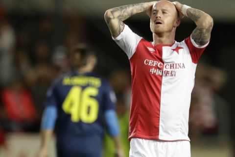 Miroslav Stoch of Slavia Praha holds his head after missing a shot during a Champions League playoff round second leg soccer match between Slavia Praha and Apoel Nicosia at Eden stadium in Prague, Czech Republic, Wednesday, Aug. 23, 2017. (AP Photo/Petr David Josek)