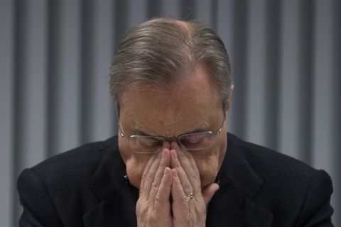 Florentino Perez, president of ACS, pauses during a news conference in Madrid, Spain, Thursday, March 15, 2018. Representatives of three European firms, Germany's construction group Hochtief, Italy's Atlantia and Spain's ACS say an agreement to buy Spain's Abertis aims to create one of the world's largest ventures to build and exploit big infrastructure projects. The operation is valued at 18.18 billion euros (22.44 billion dollars). (AP Photo/Paul White)