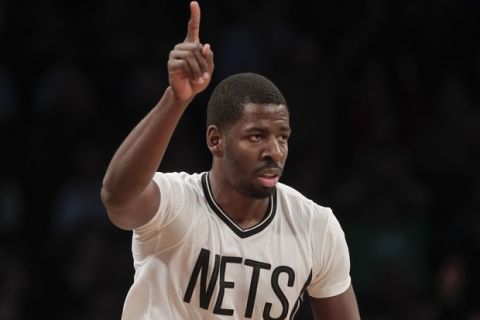 Brooklyn Nets forward Andrew Nicholson (44) motions after scoring against the Boston Celtics in the second half of an NBA basketball game, Friday, March 17, 2017, in New York. (AP Photo/Julie Jacobson)