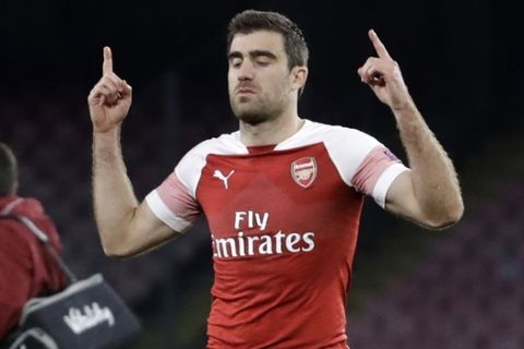 Arsenal's Sokratis Papastathopoulos reacts after the Europa League second leg quarterfinal soccer match between Napoli and Arsenal at San Paolo stadium in Naples, Italy, Thursday, April 18, 2019. Arsenal won 1-0.(AP Photo/Luca Bruno)