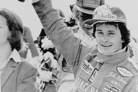 Canadian Gilles Villeneuve holds the winners' cup aloft after the Marlboro Daily Mail Race of Champions at Brands Hatch, England, on Sunday, April 15, 1979.  (AP Photo/Dave Caulkin)