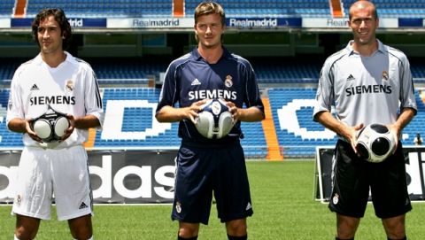 Real Madrid's Raul Gonzlaez, left David Beckham of England, centre and  Zinedine Zidane of France pose in the team's three strips for the 2005-2006 season at the Bernabeu stadium in Madrid Wednesday July 13, 2005. (AP Photo/EFE, Juanjo Martin)  ** LATIN AMERICA, CARIBBEAN AND SPAIN OUT **