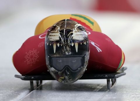 Akwasi Frimpong of Ghana starts his practice run during the men's skeleton training at the 2018 Winter Olympics in Pyeongchang, South Korea, Wednesday, Feb. 14, 2018. (AP Photo/Wong Maye-E)