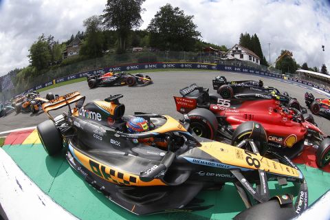 Carlos Sainz, Ferrari SF-23, and Oscar Piastri, McLaren MCL60, collide at the start