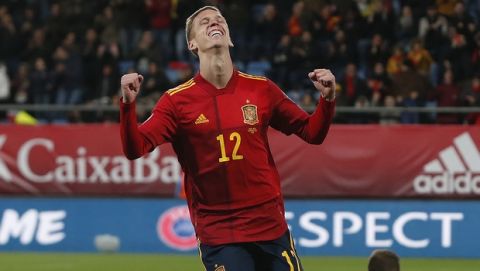 Spain's Dani Olmo celebrates after scoring his side's fifth goal during a Euro 2020 Group F qualifying soccer match between Spain and Malta at the Ramon de Carranza stadium in Cadiz, Spain, Friday Nov. 15, 2019. (AP Photo/Miguel Morenatti)