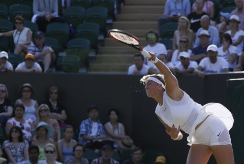Czech Republic's Petra Kvitova serves to Madison Brengle of the United States during their Women's Singles Match on day three at the Wimbledon Tennis Championships in London Wednesday, July 5, 2017. (AP Photo/Kirsty Wigglesworth)