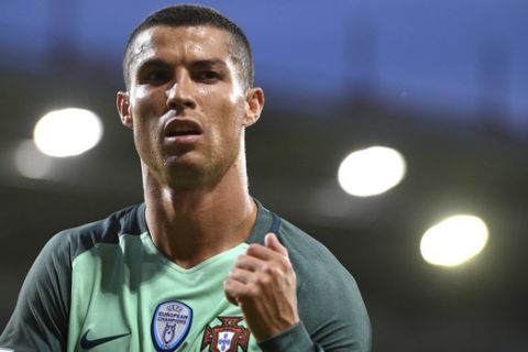 Portugal's Cristiano Ronaldo reacts during World Cup Group B qualifying match between Latvia and Portugal at the Skonto Stadium in Riga, Latvia, Friday, June 9, 2017. (AP Photo/Roman Koksarov)