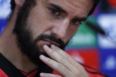 Real Madrid's Isco gestures during a press conference at the team's Valdebebas training ground in Madrid, Spain, Monday, Oct. 22, 2018. Real Madrid will play against Viktoria Plzena in a Champions League group G soccer match on Tuesday. (AP Photo/Manu Fernandez)