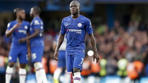 Chelsea's N'Golo Kante walks off the pitch at the end of the British Premier League soccer match between Chelsea and Liverpool, at the Stamford Bridge Stadium, London, Sunday, Sept. 22, 2019. (AP Photo/Frank Augstein)