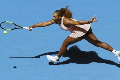 FILE - In this Jan. 3, 2019, file photo, Serena Williams of the United States stretches during her tennis match against Britain's Katie Boulter at the Hopman Cup in Perth, Australia. Williams, owner of a professional-era-record 23 Grand Slam singles titles, and Roger Federer, owner of a men's-record 20, are both 37 years old, far closer to the ends of their careers than anyone with a stake in the sport would care to think about. (AP Photo/Trevor Collens, File)