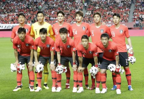 South Korea's national soccer team players, front row from left, Koo Ja-cheol, Lee Yong, Lee Jae-sung, Hwang Hee-chan, Kim Min-woo, and back row from left, Jung Woo-young, Kim Seung-gyu, Oh Ban-suk, Ki Sung-yueng, Yun Young-sun, Son Heung-min pose before a friendly soccer match against Bosnia and Herzegovina at Jeonju World Cup Stadium in Jeonju, South Korea, Friday, June 1, 2018. (AP Photo/Lee Jin-man)