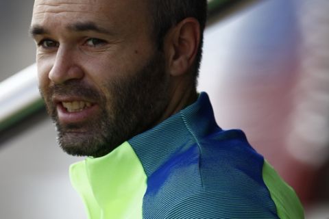 FC Barcelona's Andres Iniesta attends a training session at the Sports Center FC Barcelona Joan Gamper in Sant Joan Despi, Spain, Saturday, Feb. 18, 2017. FC Barcelona will play against Leganes in a Spanish La Liga on Sunday. (AP Photo/Manu Fernandez)