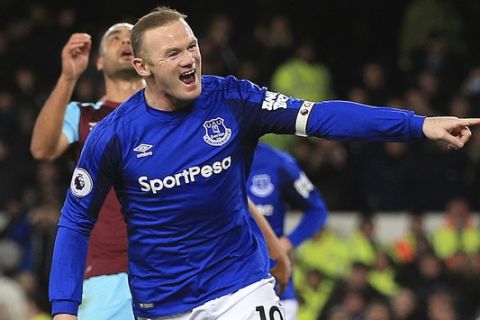 Everton's Wayne Rooney celebrates scoring his side's first goal against West Ham United during the English Premier League soccer match at Goodison Park, Liverpool, England, Wednesday Nov. 29, 2017. (Peter Byrne/PA via AP)