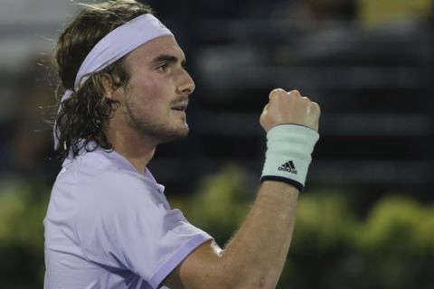 Stefanos Tsitsipas of Greece reacts after he got a point against Pablo Carreno Busta of Spain in a match of the Dubai Duty Free Tennis Championship in Dubai, United Arab Emirates, Tuesday, Feb. 25, 2020. (AP Photo/Kamran Jebreili)