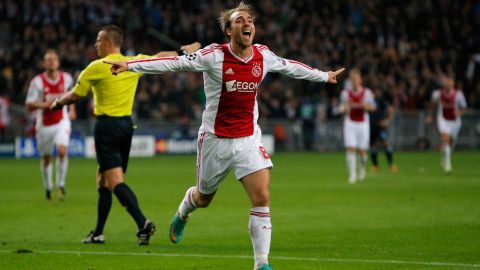 AMSTERDAM, NETHERLANDS - OCTOBER 24:  Christian Eriksen (#8) of Ajax celebrates after he shoots and scores his teams third goal of the game during the Group D UEFA Champions League match between AFC Ajax and Manchester City FC at Amsterdam ArenA on October 24, 2012 in Amsterdam, Netherlands.  (Photo by Dean Mouhtaropoulos/Getty Images)