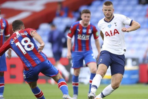 Tottenham's Eric Dier, right, is challenged by Crystal Palace's James McArthur during the English Premier League soccer match between Crystal Palace and Tottenham at the Selhurst Park stadium in London, Sunday, July 26, 2020. (Warren Little/Pool via AP)