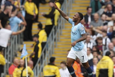 Manchester City's Raheem Sterling celebrates after scoring the opening goal during the English Premier League soccer match between Manchester City and Newcastle United at the Etihad Stadium in Manchester, England, Saturday, Sept. 1, 2018. (AP Photo/Jon Super)