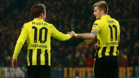 DORTMUND, GERMANY - MARCH 05: Mario Goetze (L) of Dortmund celebrates with his team mate Marco Reus after scoring his team's second goal during the UEFA Champions League round of 16 leg match between Borussia Dortmund and Shakhtar Donetsk at Signal Iduna Park on March 5, 2013 in Dortmund, Germany.  (Photo by Joern Pollex/Bongarts/Getty Images)