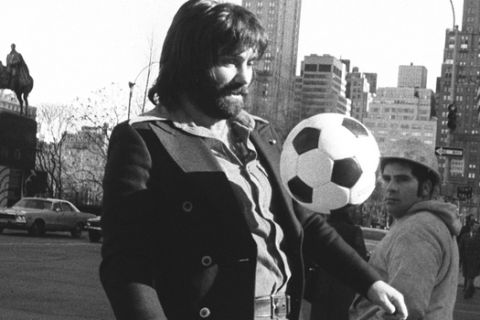 ** FILE ** Manchester United great George Best  juggles the ball near Central  Park in New York in this Jan. 17, 1975 file photo. Best, the dazzling soccer icon of the 1960s and 70s who reveled in a hard-drinking playboy lifestyle, died Friday Nov. 25, 2005 in London after decades of alcohol abuse, hospital officials said. He was 59. (AP Photo)