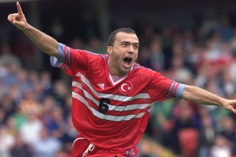 Turkey's Arif Erdem celebrates his goal against Northern Ireland during their group three Euro 2000 soccer Championship qualifying match at Windsor Park Belfast, Saturday, Sept. 4 1999. (AP Photo/Peter Morrison)