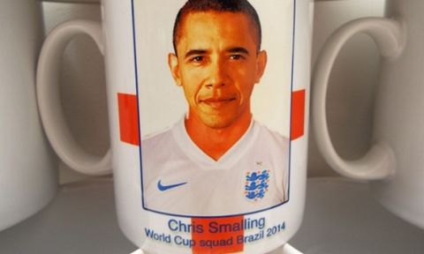 Mandatory Credit: Photo by REX (3857160a)
Barack Obama mistaken for England defender Chris Smalling
Red Card: Barack Obama Mistaken for England Player on Souvenir Mug
Maybe the Leader of the Free World might have improved our chances?

A bumbling souvenir company deserve a red card - after mistaking Barack Obama for England player Chris Smalling on a memento mug.

The unnamed company - they're embarrassed - were keen to go top of the league with a range of merchandise for the World Cup.

But when they unpacked the 2,000 mugs featuring the faces of our brave - and underperforming - heroes, it was clear someone's footballing research skills were strictly non-league.

They turned to Dorset-based expert clearance resellers Wholesale Clearance UK to try and shift the stock that could have easily appeared in an Only Fools and Horses episode.

Karl Baxter MD for Wholesale Clearance says the company contacted him with the hope of off-loading the stock.

He now believes a junior member of staff could be facing demotion after being trusted with picture research.

Karl explains: "The Dorset company in question (whose blushes we shall protect for now....maybe!) was given the seemingly easy job of sourcing royalty free pictures of each England squad player to use on the England mugs - along with other accompanying items such as England coasters, England mouse mats etc.

"They passed this onto to their young, bright eyed and bushy tailed new apprentice. The designs were proofed and signed off by their Boss, who had clearly had a heavy night with the lads playing poker and before he'd had his first vat of coffee the following morning.

"They immediately contacted us and 2,000 of the England items was dispatched to our warehouse. We eagerly unpacked them and, indeedm it turned out that the Chris Smalling cup had Barack Obama's head on instead of Chris's."

Wholesale Clearance is now...
For more information visit http://www.rexfeatures.com/stacklink/BQISITBXW