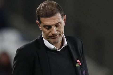 West Ham manager Slaven Bilic watches the English Premier League soccer match between West Ham and Liverpool at the London Stadium in London, Saturday, Nov. 4, 2017. (AP Photo/Kirsty Wigglesworth)