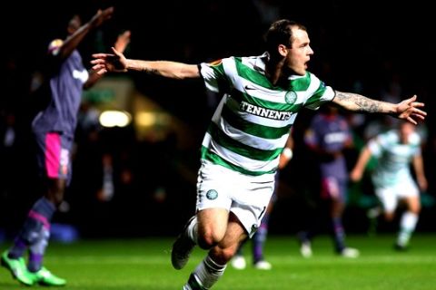 Celtic's Anthony Stokes, right, celebrates his goal during their Europa League group I soccer match against Renne at Celtic Park, Glasgow, Scotland, Thursday Nov. 3, 2011. (AP Photo/Scott Heppell)