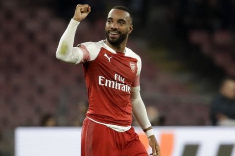 Arsenal's Alexandre Lacazette celebrates after scoring his side's first goal during the Europa League second leg quarterfinal soccer match between Napoli and Arsenal at San Paolo stadium in Naples, Italy, Thursday, April 18, 2019. (AP Photo/Luca Bruno)