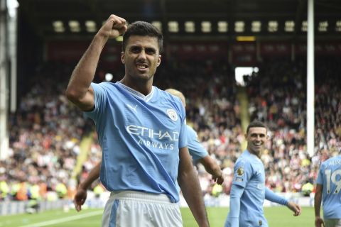 Manchester City's Rodrigo celebrates after scoring his side's second goal during the English Premier League soccer match between Sheffield United and Manchester City at Bramall Lane in Sheffield, England, Sunday, Aug. 27, 2023. (AP Photo/Rui Vieira)