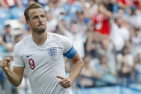 England's Harry Kane celebrates after he scored his side's fith goal during the group G match between England and Panama at the 2018 soccer World Cup at the Nizhny Novgorod Stadium in Nizhny Novgorod , Russia, Sunday, June 24, 2018. (AP Photo/Antonio Calanni)