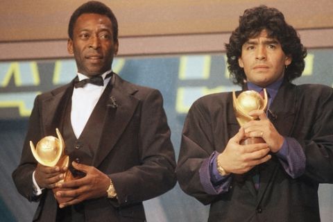 Pele and Maradona seen together in Italy in March 1987 as they received the trophy of ?Sports Oscar? for their performance in the soccer fields. (AP Photo/Milan)