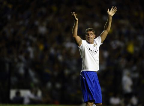 Former Boca Juniors footballer Martin Palermo celebrates a goal during his farewell football match, at La Bombonera stadium in Buenos Aires, on February 4, 2012. AFP PHOTO / Alejandro PAGNI (Photo credit should read ALEJANDRO PAGNI/AFP/Getty Images)