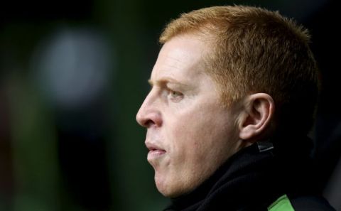 Celtic manager coach Neil Lennon waits for the start of the Champions League group H soccer match between Celtic and AC Milan at Celtic Park in Glasgow, Scotland, Tuesday, Nov. 26, 2013. (AP Photo/Scott Heppell)
