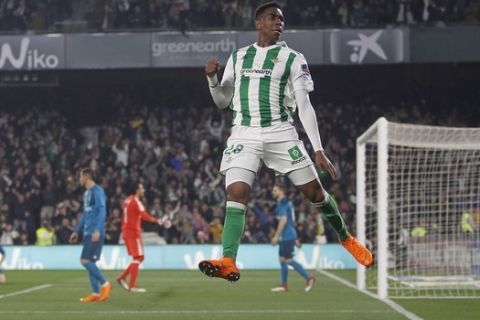 Betis' Junio, reacts after scoring against Real Madrid during La Liga soccer match between Betis and Real Madrid at the Villamarin stadium, in Seville, Spain, on Sunday, Feb. 18, 2018. (AP Photo/Miguel Morenatti)