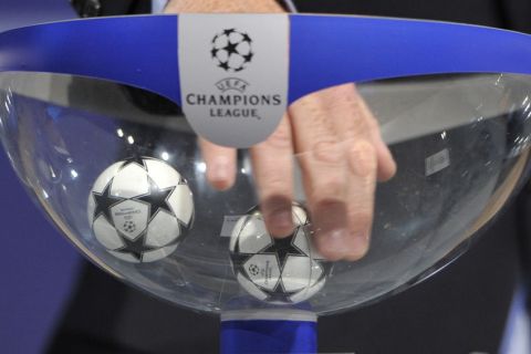 NYON, SWITZERLAND - AUGUST 08:  Draw balls are shuffled during the 2014/15 UEFA Champions League Play-off round draw at the UEFA headquarters, The House of European Football on August 8, 2014 in Nyon, Switzerland.  (Photo by Harold Cunningham/Getty Images)