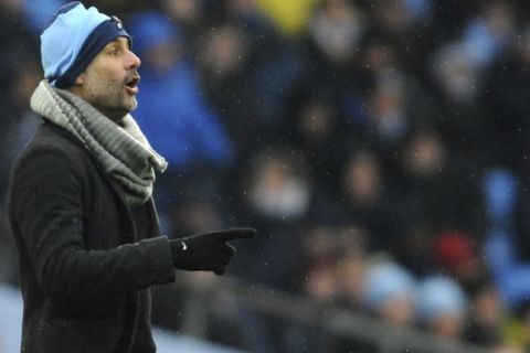 Manchester City manager Josep Guardiola gestures during the English Premier League soccer match between Manchester City and Everton at Etihad stadium in Manchester, England, Saturday, Dec. 15, 2018. (AP Photo/Rui Vieira)