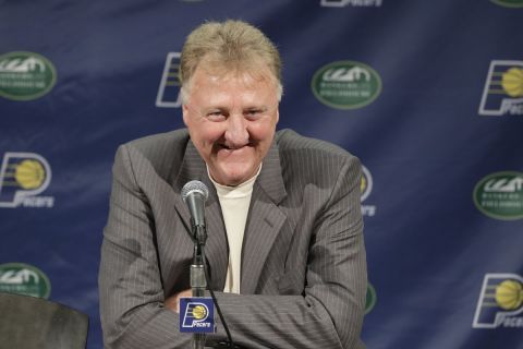 FILE - In this July 8, 2016, file photo, Indiana Pacers NBA basketball team president Larry Bird smiles during a news conference in Indianapolis. Larry Bird is the only person in league history to be voted MVP, Coach of the Year and Executive of the Year. (AP Photo/Darron Cummings, File)