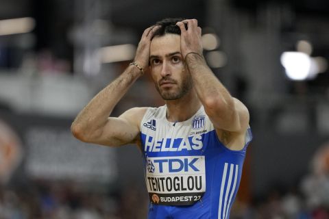 Miltiadis Tentoglou, of Greece, reacts after his last attempt in the Men's long jump final during the World Athletics Championships in Budapest, Hungary, Thursday, Aug. 24, 2023. (AP Photo/Matthias Schrader)