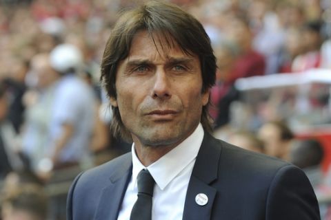 FILE - In this Saturday, May 19, 2018 file photo, Chelsea manager Antonio Conte looks on during their English FA Cup final soccer match against Manchester United at Wembley stadium in London, England. Chelsea has fired manager Antonio Conte after a two-year tenure in which he won the English Premier League and FA Cup. The London club said on Friday, July 13, "We wish Antonio every success in his future career." (AP Photo/Rui Vieira, file)