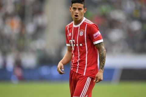 Bayern's James Rodriguez watches during the Telekom Cup soccer final between Bayern Munich and Werder Bremen at the Borussia Park in Moenchengladbach, Saturday, July 15, 2017. Bayern defeated Bremen with 2-0. (AP Photo/Martin Meissner)