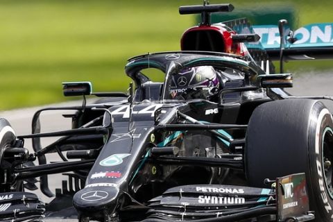 Mercedes driver Lewis Hamilton of Britain steers his car during the Formula One Grand Prix at the Spa-Francorchamps racetrack in Spa, Belgium, Sunday, Aug. 30, 2020. (Francois Lenoir/Pool Photo via AP)