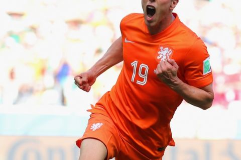 FORTALEZA, BRAZIL - JUNE 29:  Klaas-Jan Huntelaar of the Netherlands celebrates scoring his team's second goal on a penalty kick in stoppage time during the 2014 FIFA World Cup Brazil Round of 16 match between Netherlands and Mexico at Castelao on June 29, 2014 in Fortaleza, Brazil.  (Photo by Dean Mouhtaropoulos/Getty Images)