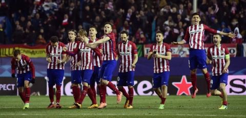 "Atletico de Madrid players celebrate winning during the UEFA Champions League last sixteen second leg football match Club Atletico de Madrid vs PSV Eindhoven at the Vicente Calderon stadium in Madrid on March 15, 2016. / AFP / PIERRE-PHILIPPE MARCOU        (Photo credit should read PIERRE-PHILIPPE MARCOU/AFP/Getty Images)"