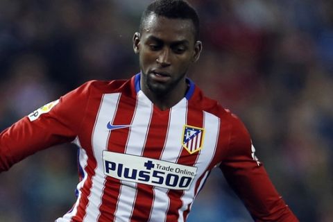 FILE - In this Nov. 8, 2015, file photo, Atletico Madrid's Jackson Martinez battles for the ball during the Spanish La Liga soccer match between Atletico Madrid and Sporting Gijon at the Vicente Calderon stadium in Madrid. Chinese Super League clubs have splashed out close to $300 million in the winter transfer window - that closes on Friday, Feb. 26, 2016 - on big names from Europe and South America such as Ramires, Alex Teixeira, Ezequiel Lavezzi, Jackson Martinez and Gervinho. (AP Photo/Francisco Seco, File)